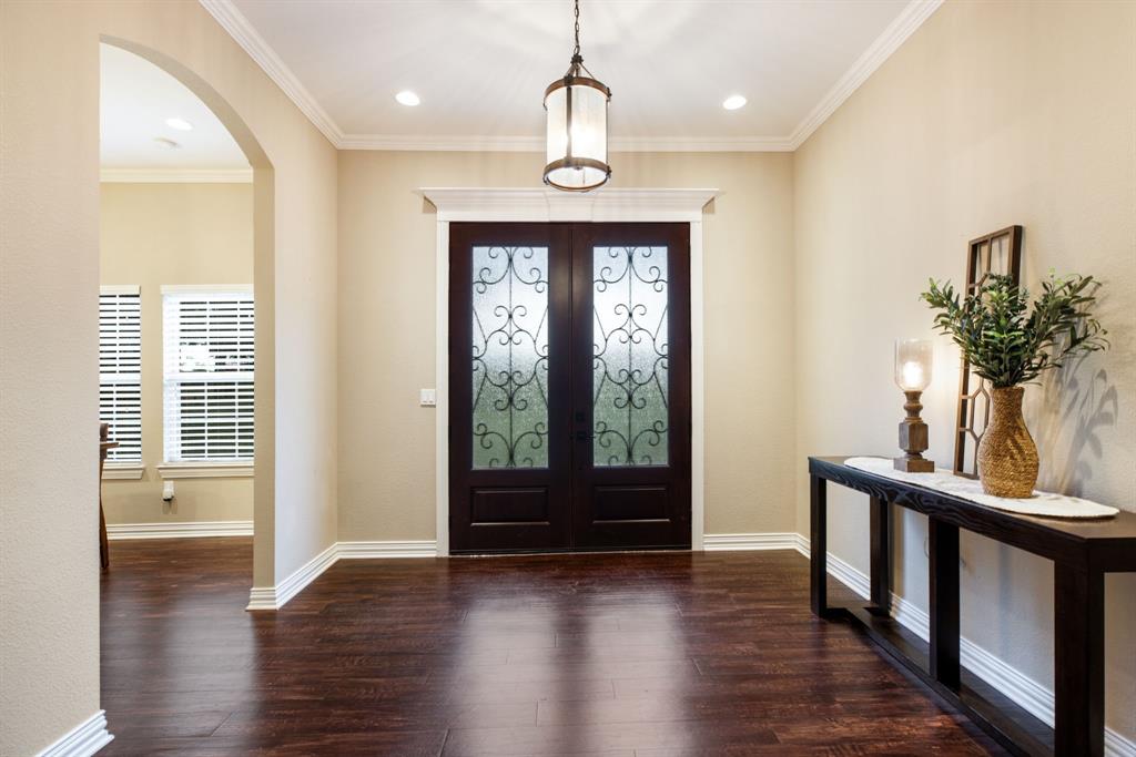 Beautiful grand entry with double iron doors!