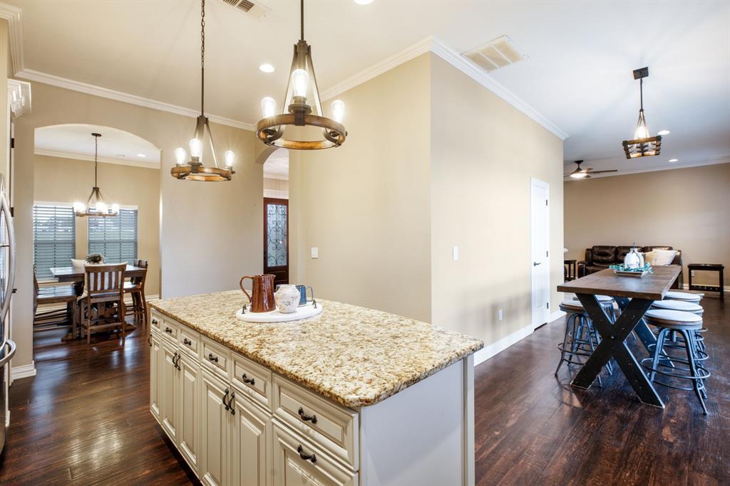 Engineered hardwoods throughout the primary living spaces.