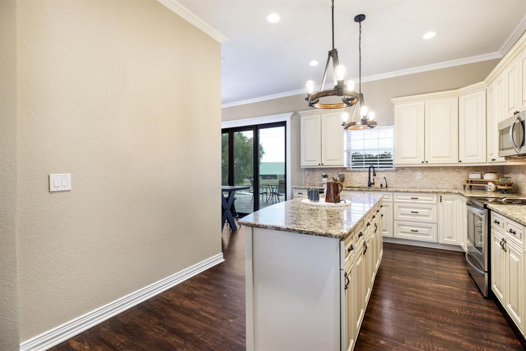 Granite countertops and custom cabinetry.