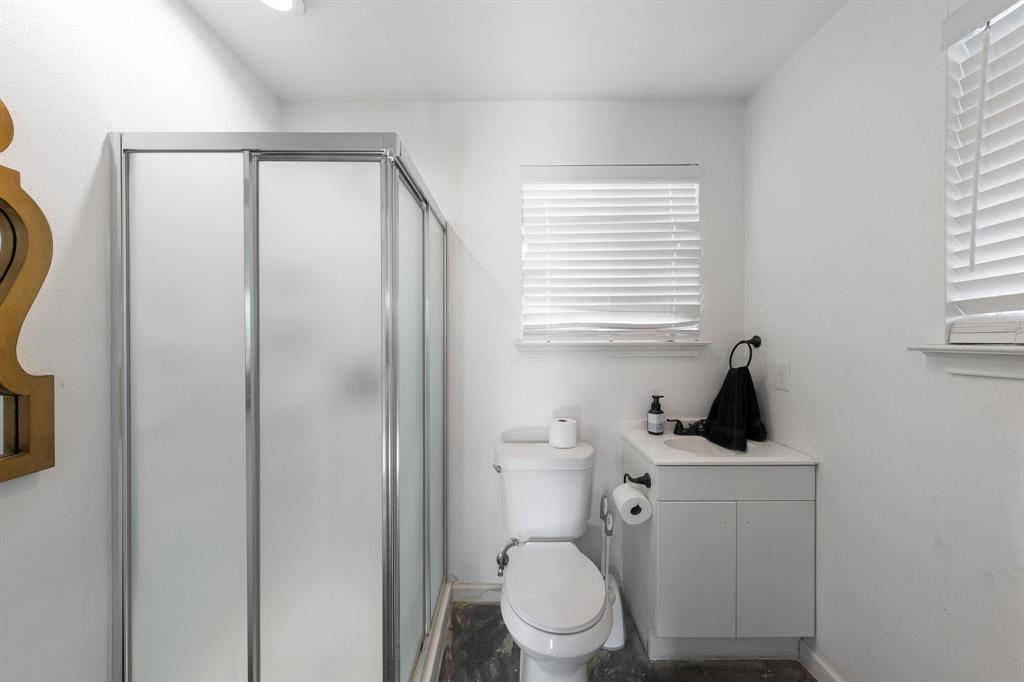 Bathroom w shower in the guest quarters off of the pool area.