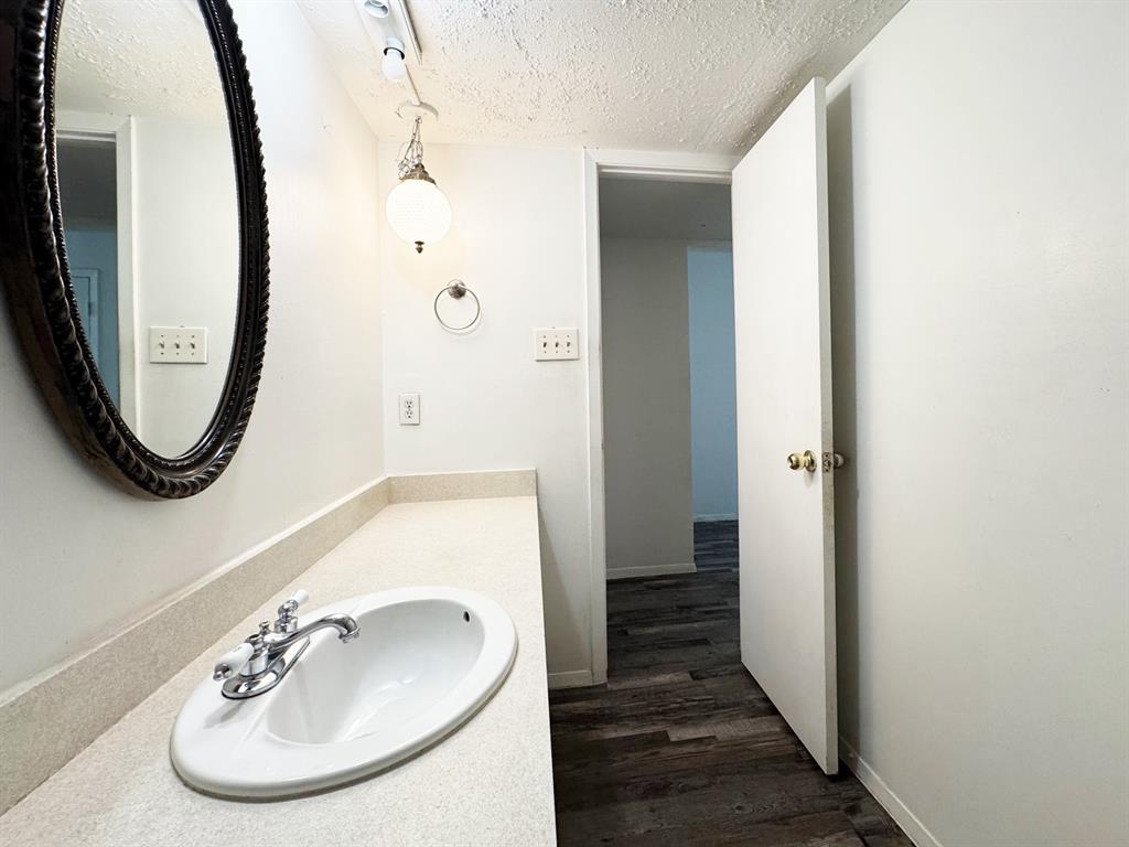 Hall bathroom looking into hallway