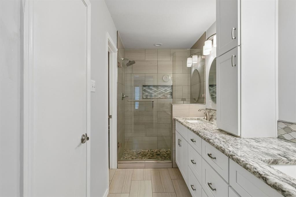 Remodeled ensuite, primary bath with shower, dual vanities, water closet and walk-in closet