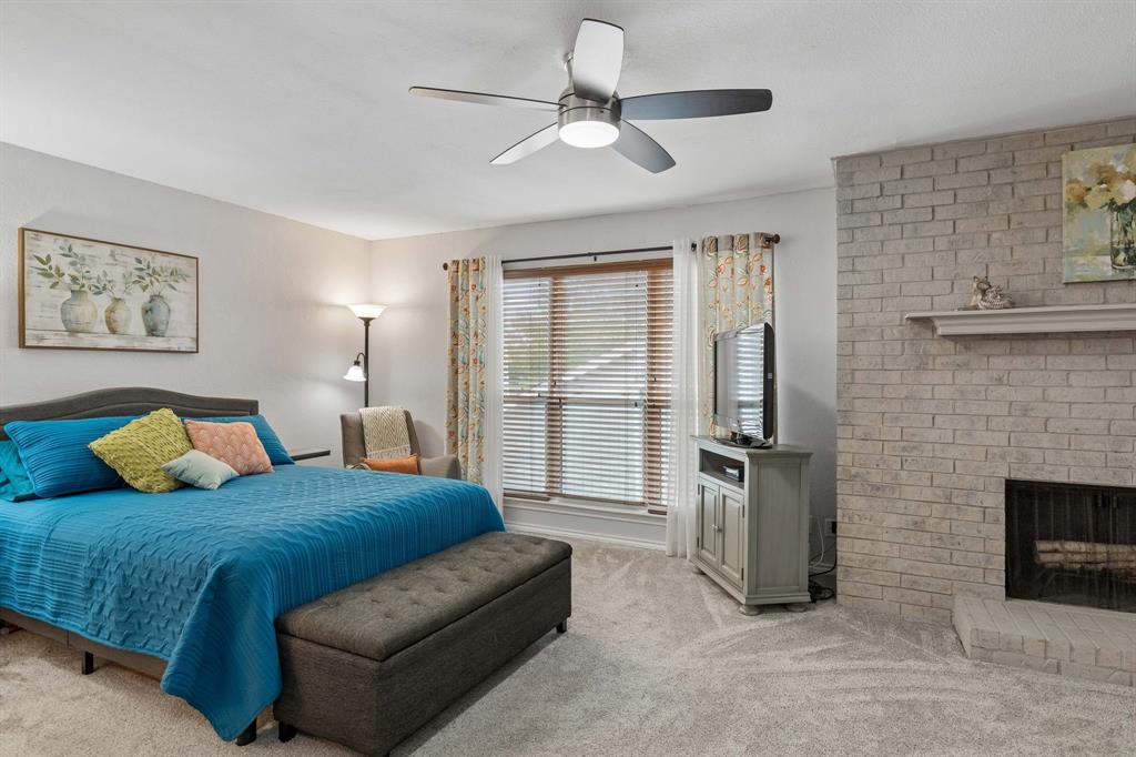 Huge primary bedroom with fireplace
