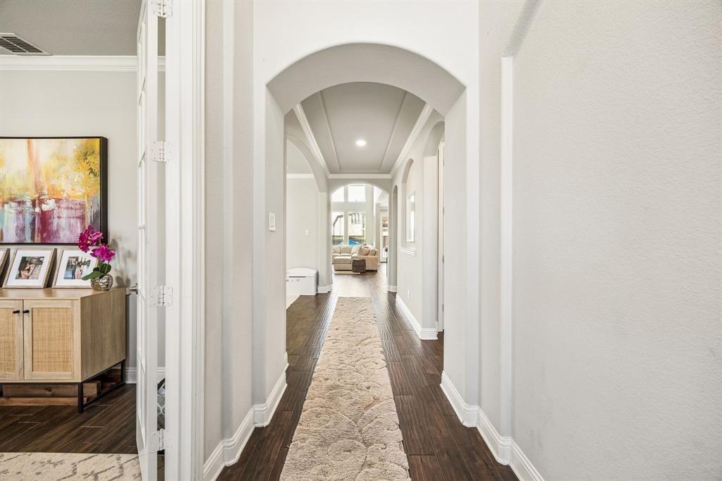 Once you enter you will have an office on the left and guesr room to the right with a full bath.