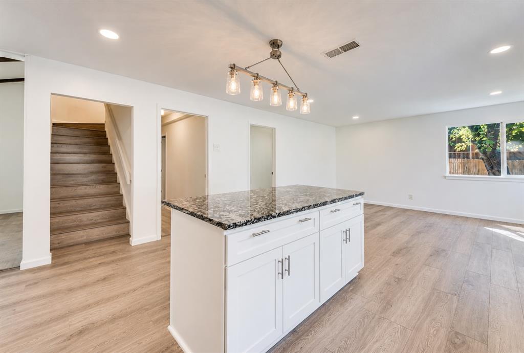 Stairs leading up to full bedroom and bath.