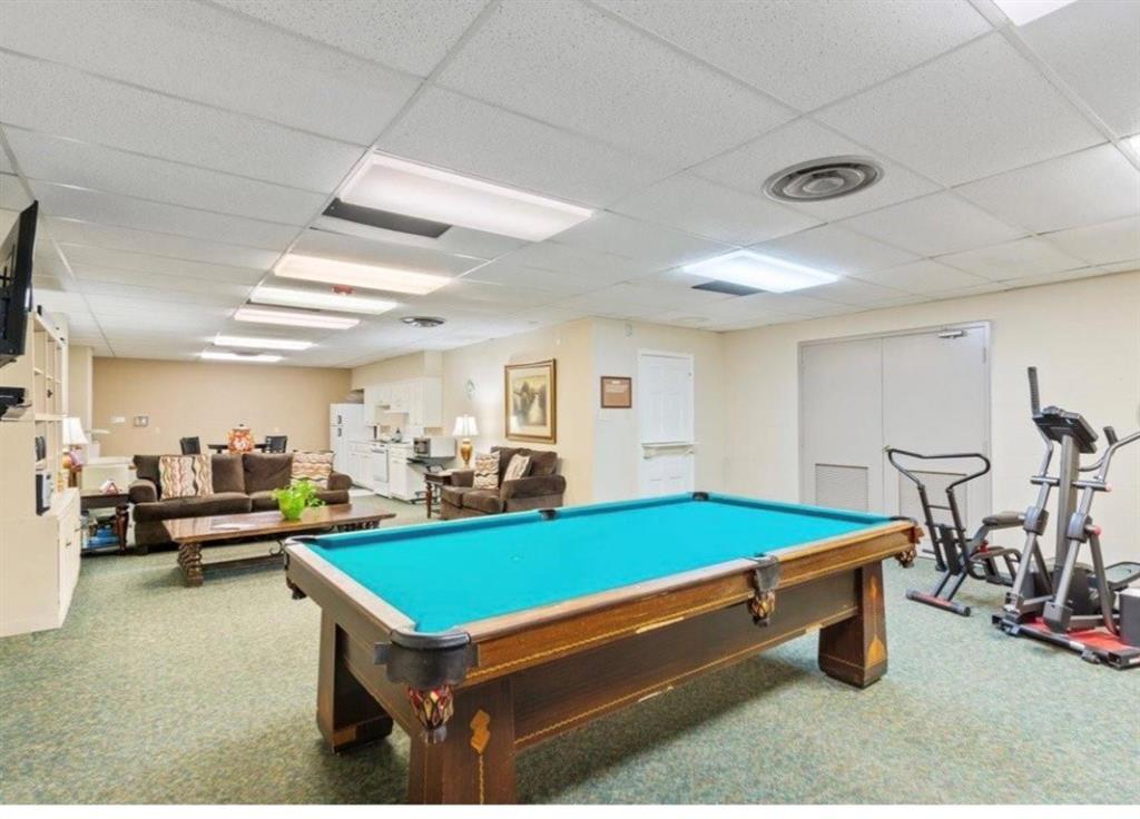 Pool table and sitting/TV area