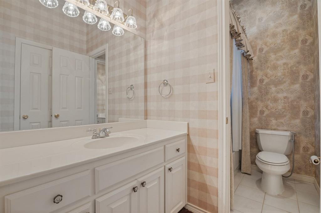 spare bathroom with split vanity design