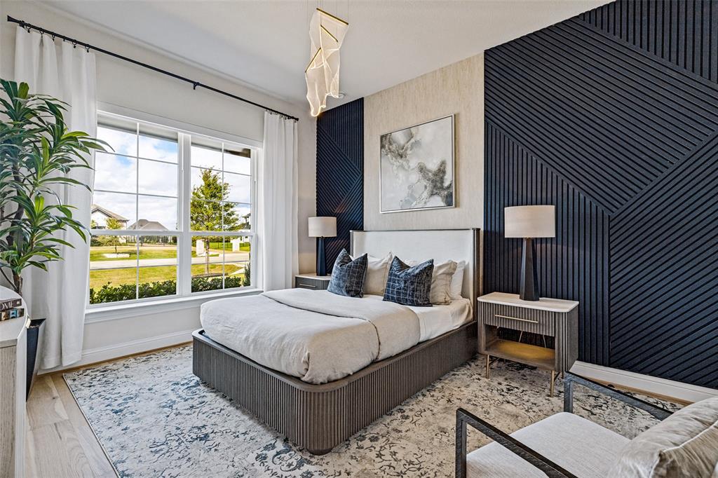 Geometric slat wall paneling, expansive multi-pane windows, wood-finish flooring, and a contemporary architectural pendant light fixture