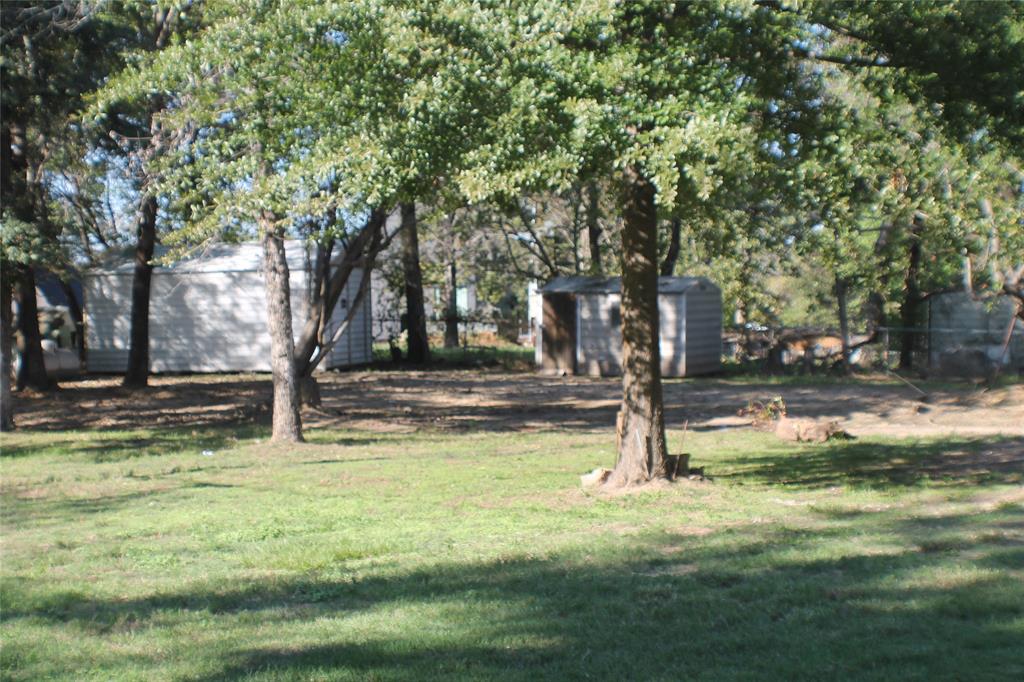 Half acre with storage sheds Half acre with storage sheds