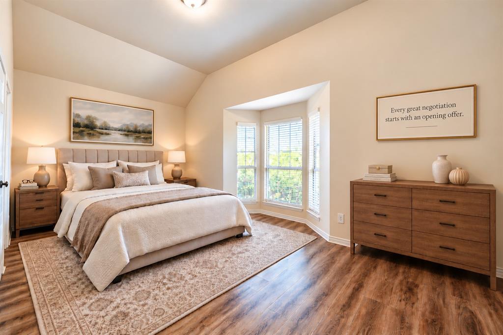 Vaulted ceilings, bay window, and wood-look LVP flooring