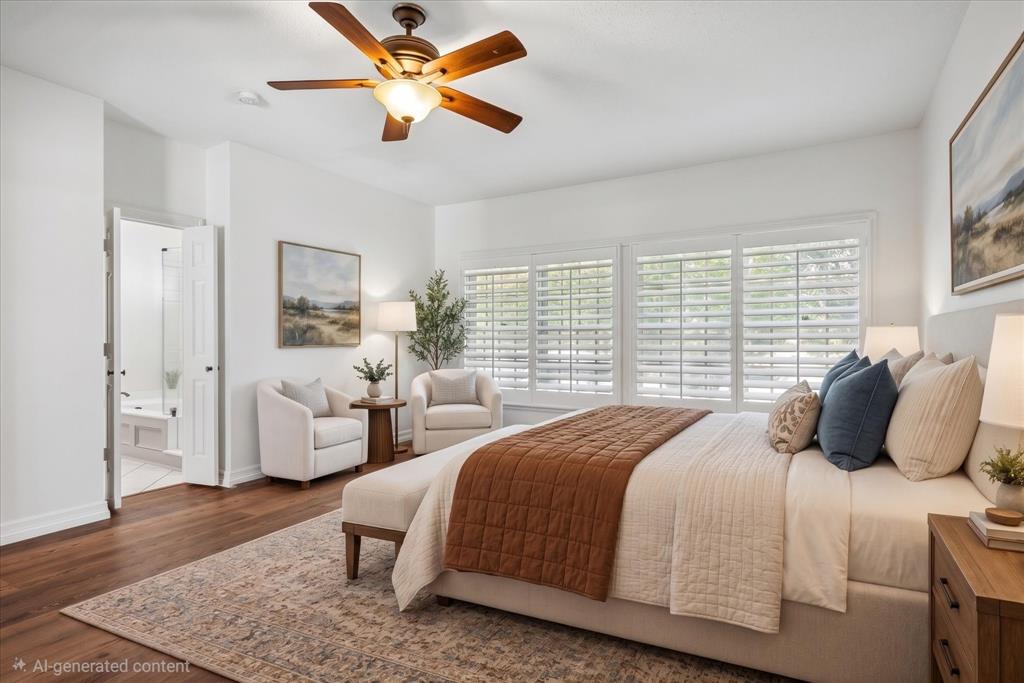 Virtually Staged Primary bedroom plantation shutters, and a central ceiling fan with integrated lighting