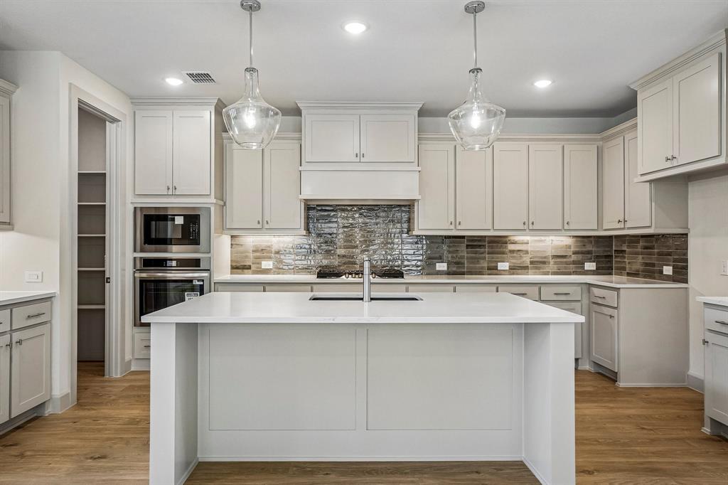 Your spacious kitchen island is the perfect place for friends and family to gather round!