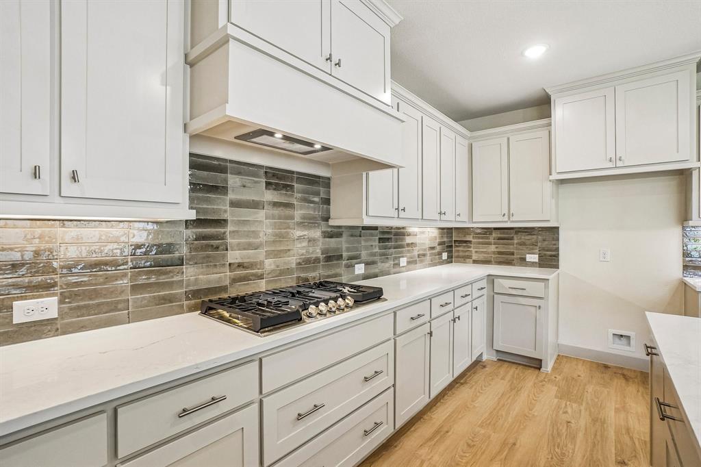 Welcome to your dream kitchen featuring gorgeous cabinetry, contemporary countertops, and stainless appliances.