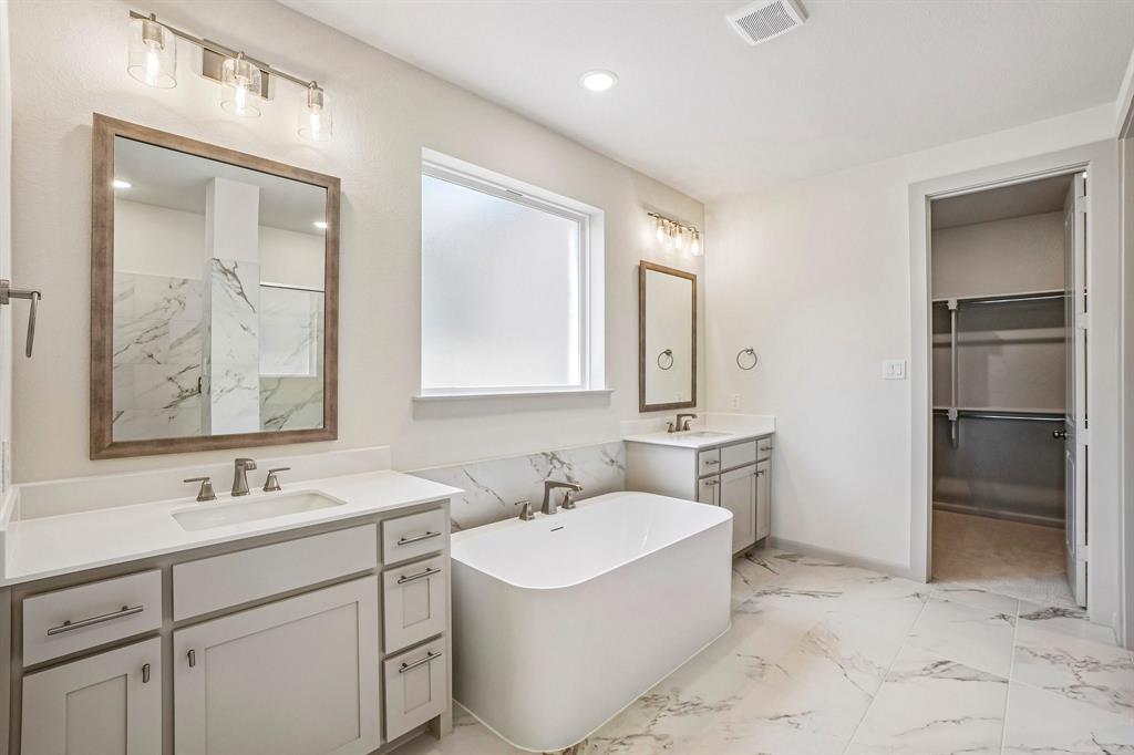 Packed with style and plenty of room for two, your new owner's bath is the perfect place to start or end your day!