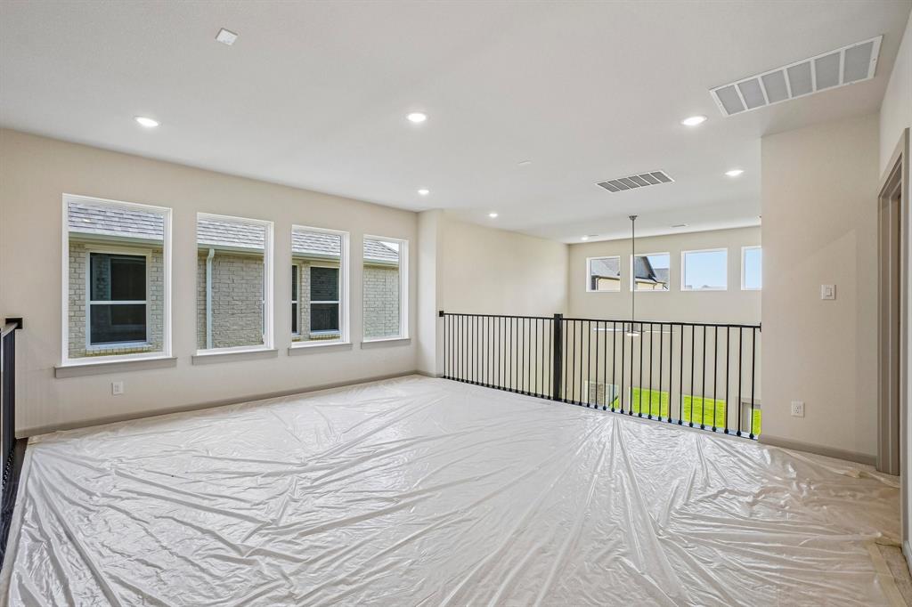 Spacious and bright, this game room offers endless family fun time!