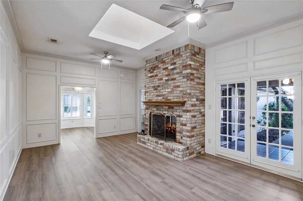 One of two living areas with a double sided gas fireplace.