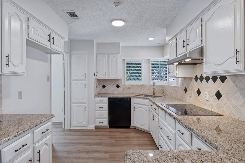 Granite counters, Kitchen Aid Convection oven and built in icrowave.