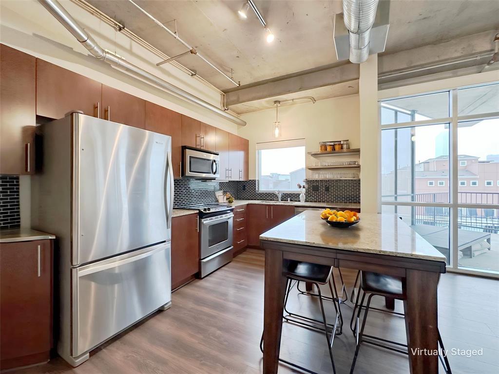 Stainless steel appliances, refrigerator, washer anddryer included