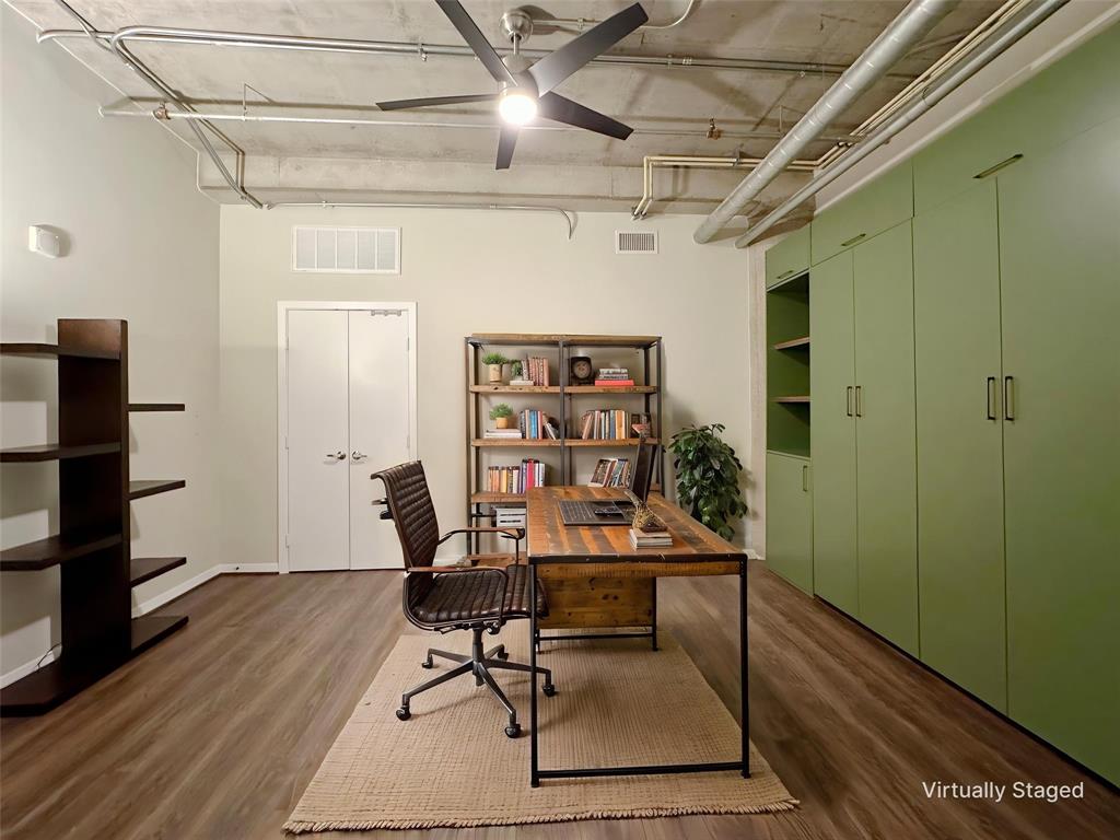 Bedroom doubles as a great office and has a builtin Queen size Murphy bed