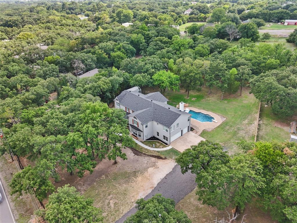 2.89 acres of trees and privacy outside city limits