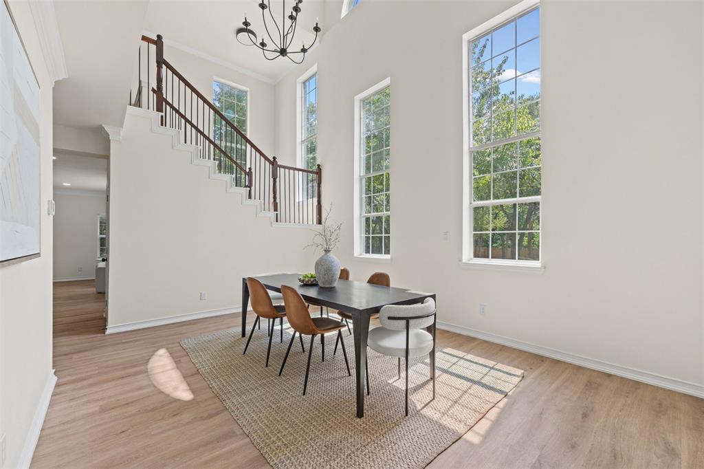 Dining area overlooking the backyard and outdoor living spaces