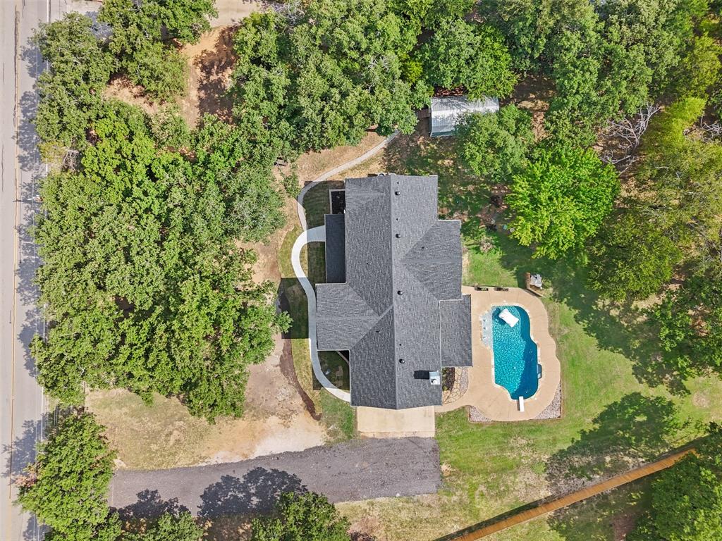 2.89 acres of trees and privacy outside city limits