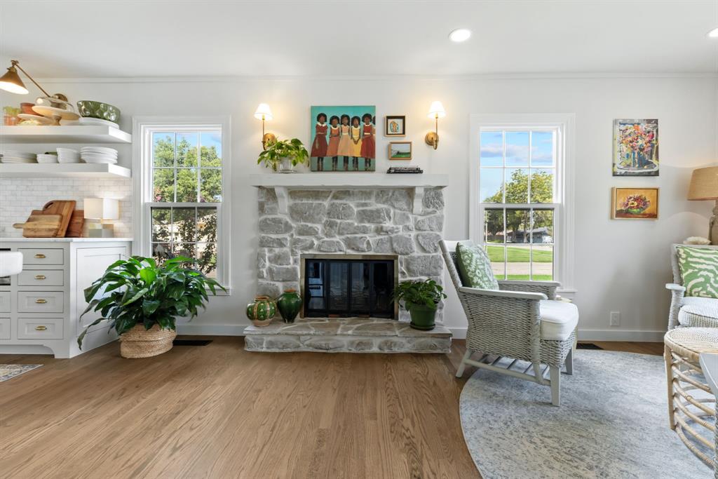 Stone fireplace in the heart of the home - the Kitchen!