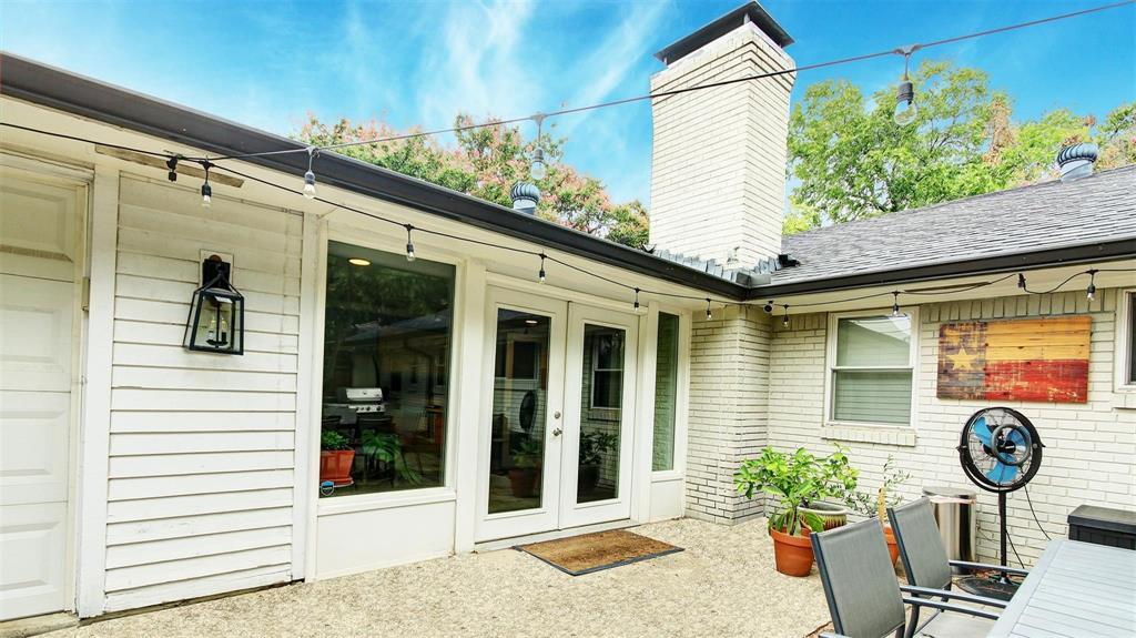 Patio is conveniently located of the sunroom and is big enough area for a good size patio table, chairs, grill, etc