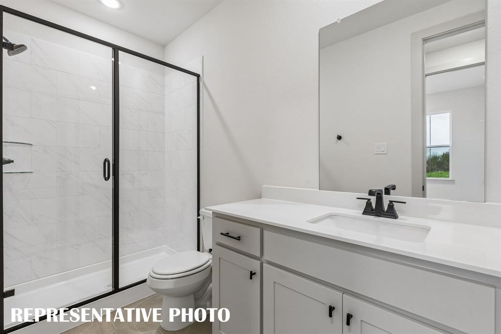Your guests will never want to leave the beautiful and spacious guest baths in our Toulouse II plan!  REPRESENTATIVE PHOTO