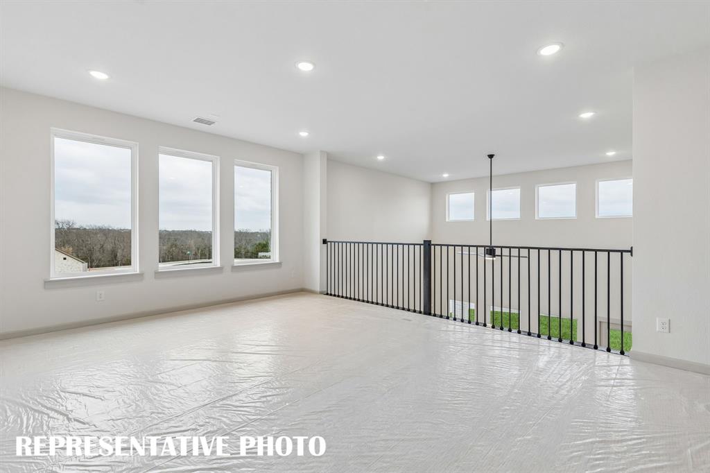 Open, light, bright and airy, the entire family will love entertaining in this over the top game room!  REPRESENTATIVE PHOTO