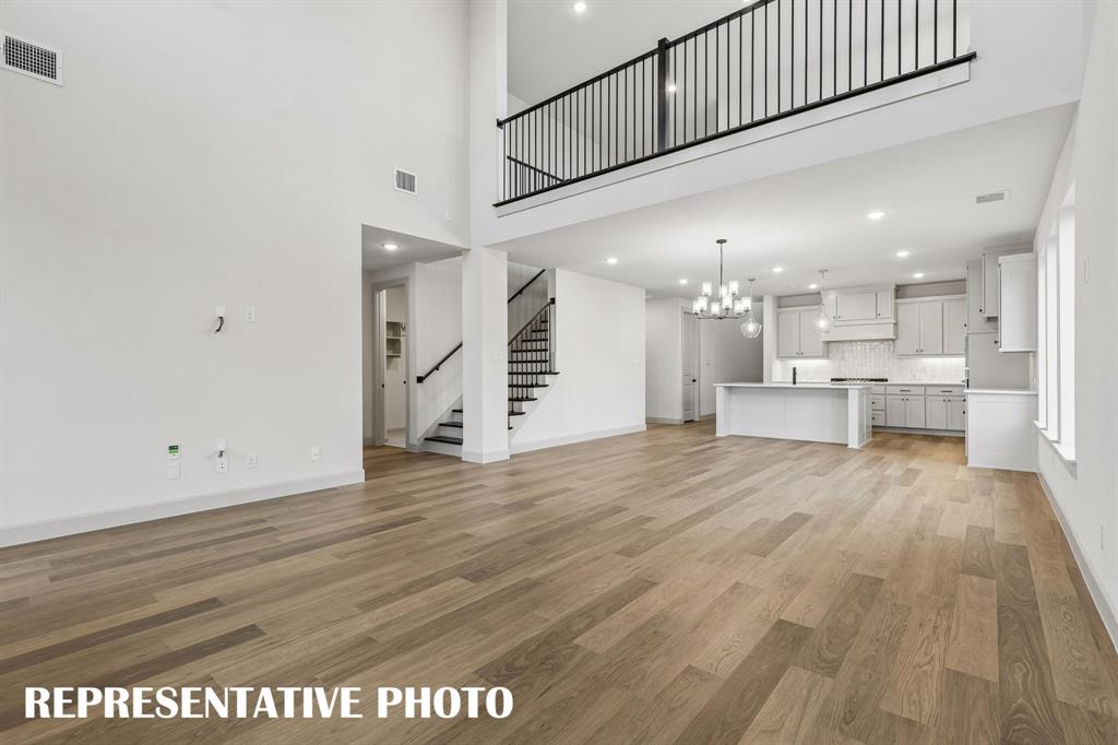 Featuring the game room open to the family room, our Sophie plan offers multi-level entertainment zones!  REPRESENTATIVE PHOTO