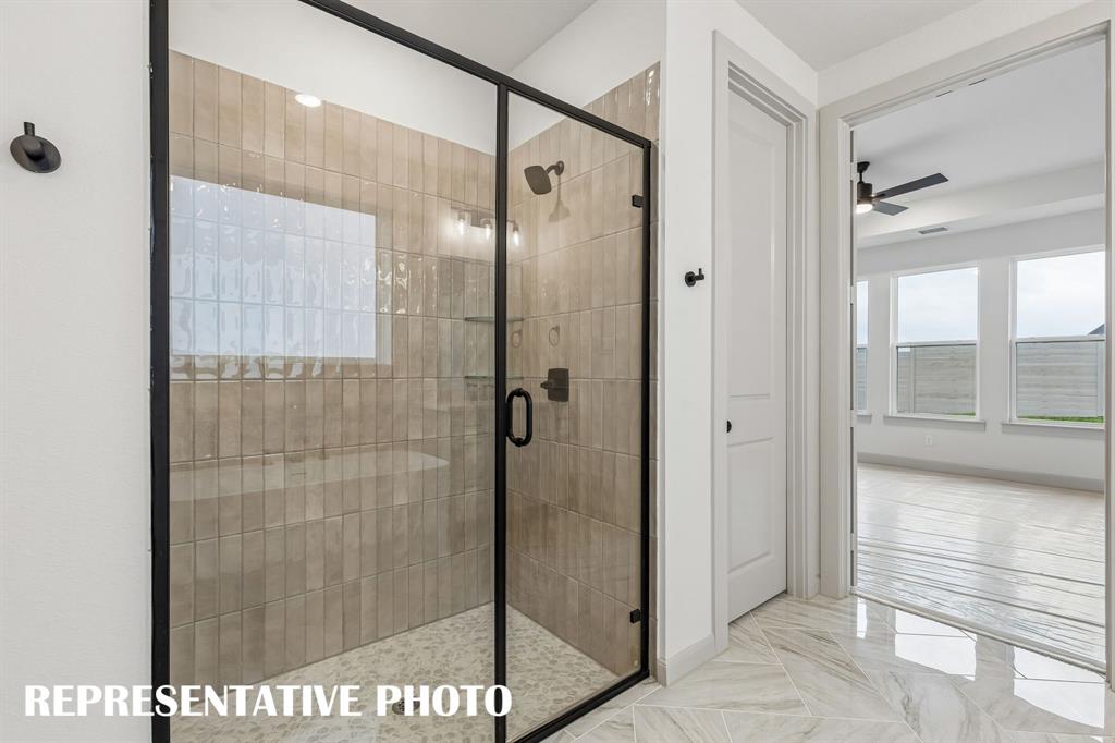 Relax and enjoy a long luxurious shower in this spacious walk in shower!   REPRESENTATIVE PHOTO