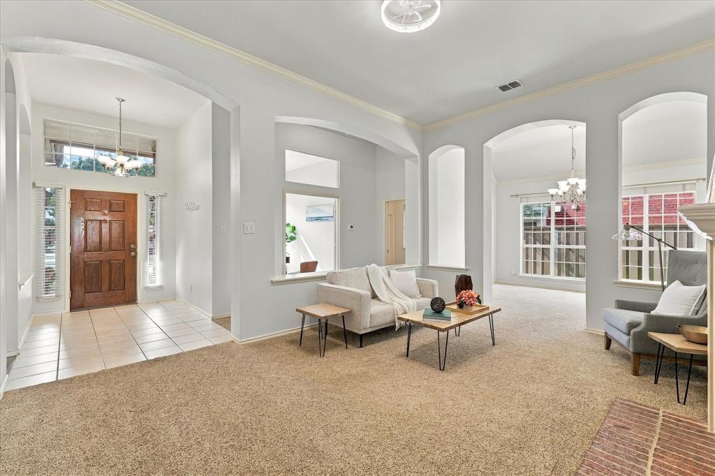 Overlooking entry way, living room, dining room, and office.