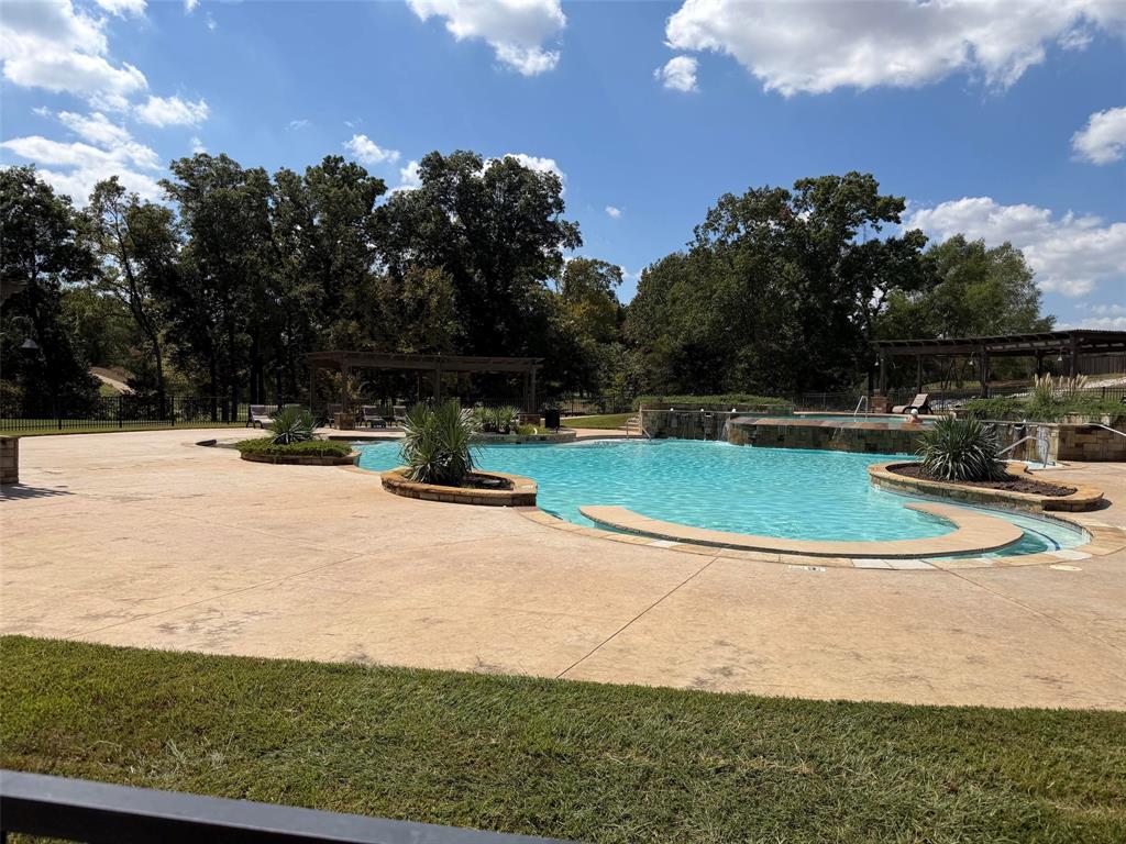 Amenities include this lovely outdoor pool area