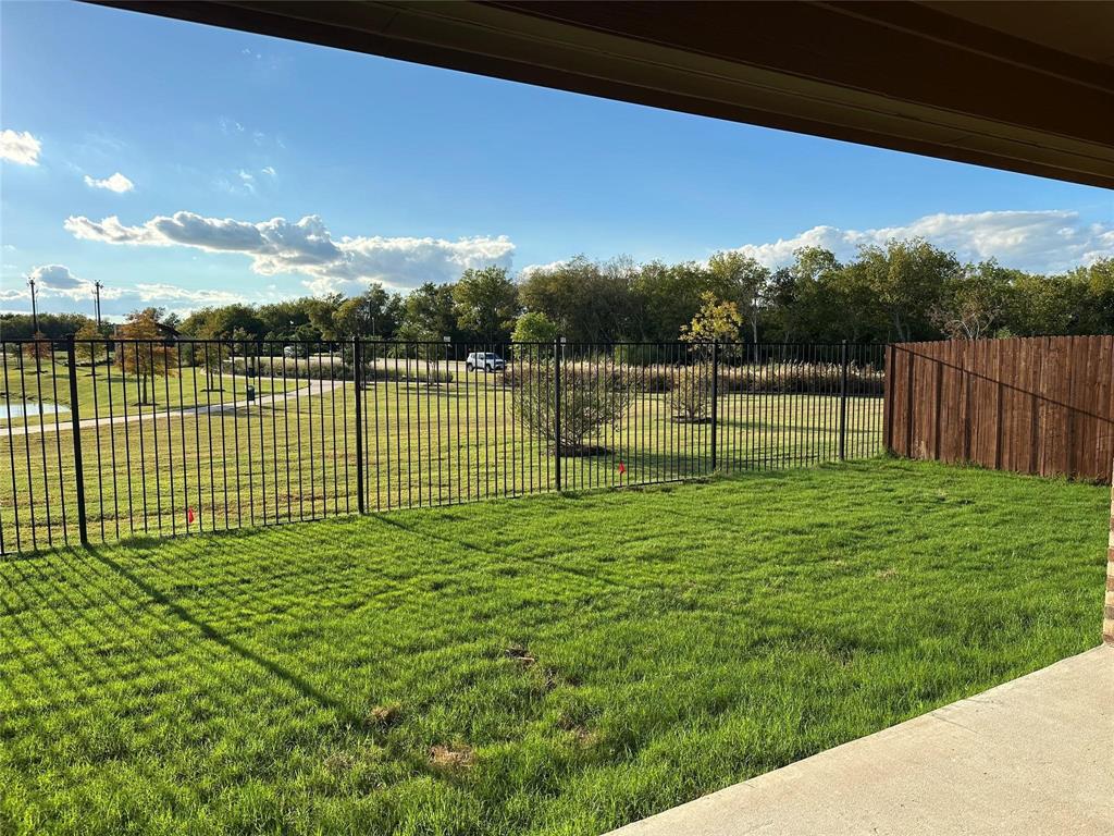 View of yard with a patio