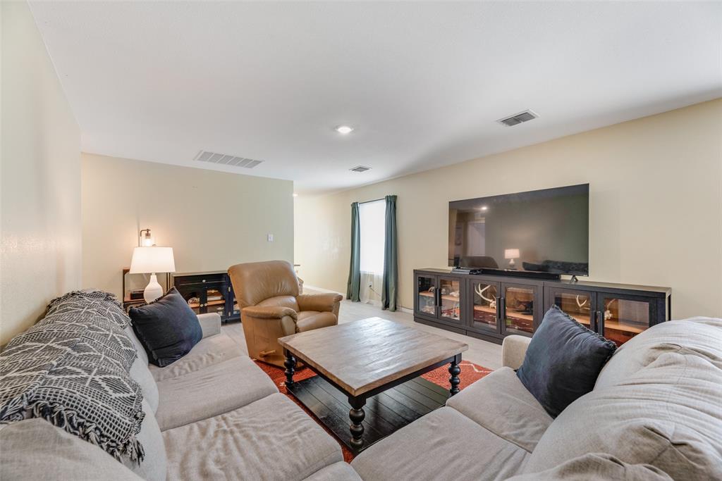 Interior space featuring recessed lighting and neutral wall paint