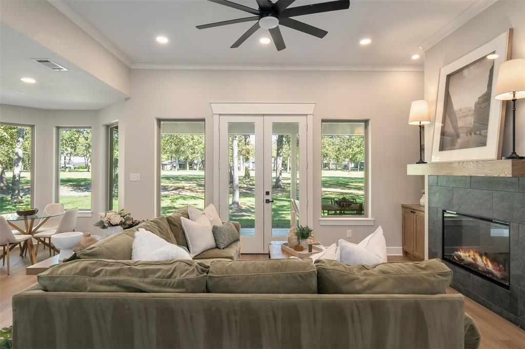 Wall of windows framing sweeping golf course views