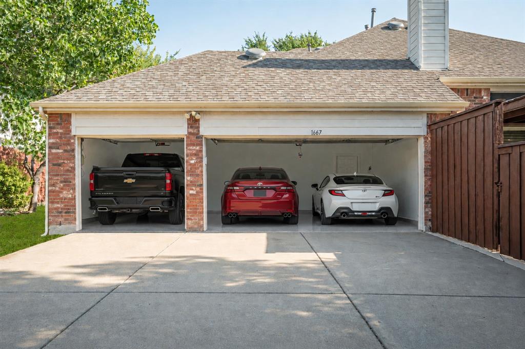Yes!!  Three-Car Garage (Vehicles Have Been Virtually Added)