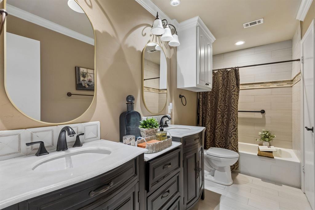 Full Bathroom with Dual Vanities