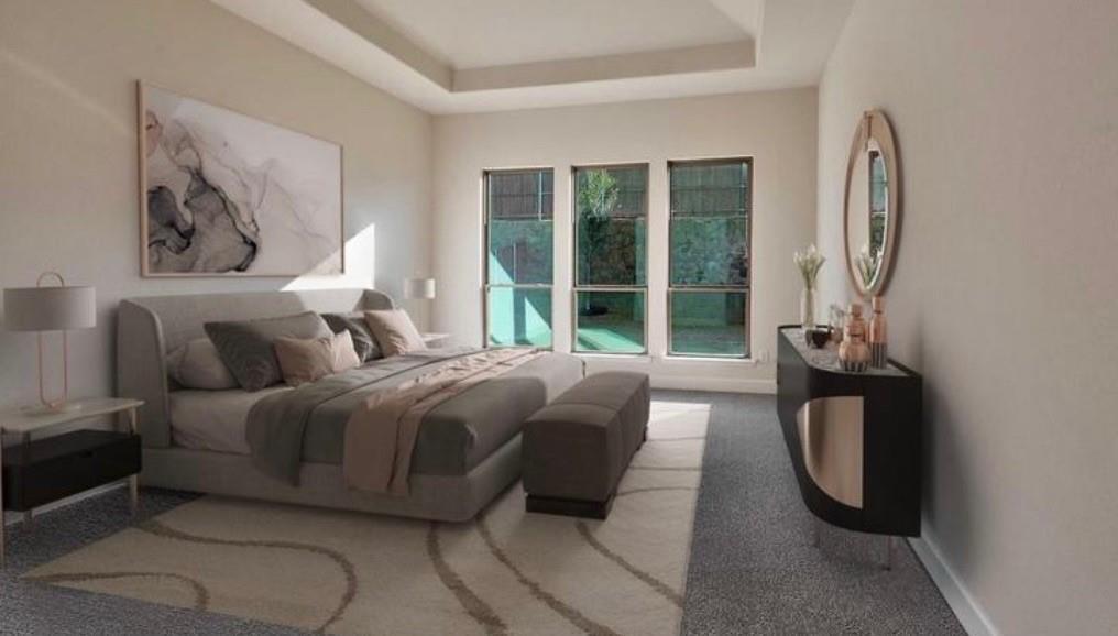 Tray ceiling featuring recessed lighting and triple windows
