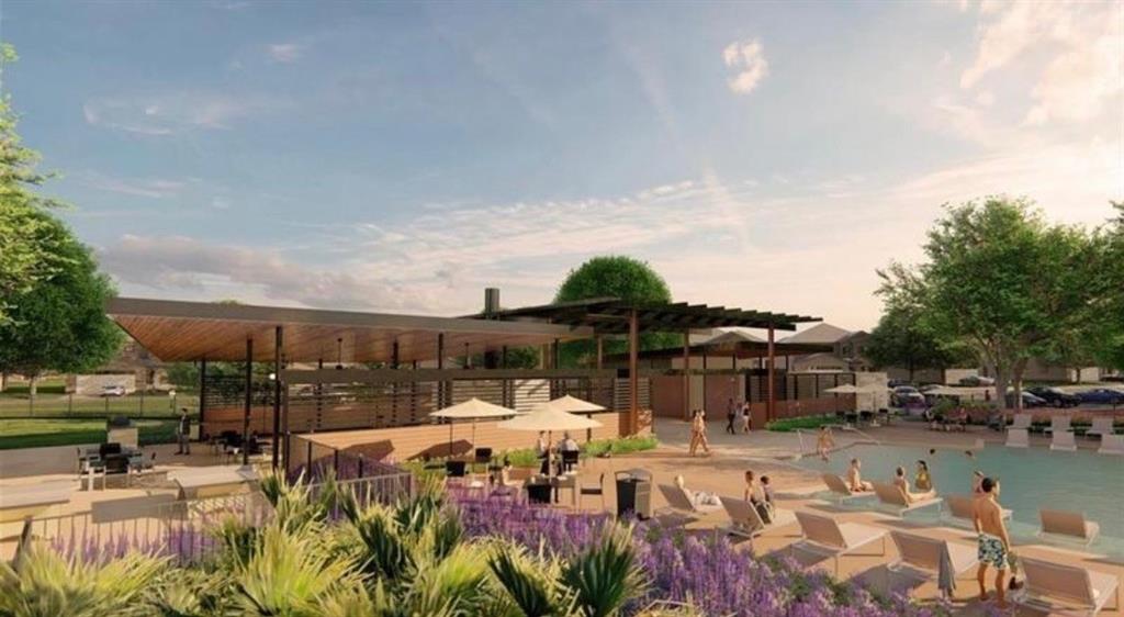 Outdoor community pool area featuring a paved sun deck, expansive shaded pavilion, built-in masonry grill station, and architectural pergola structures