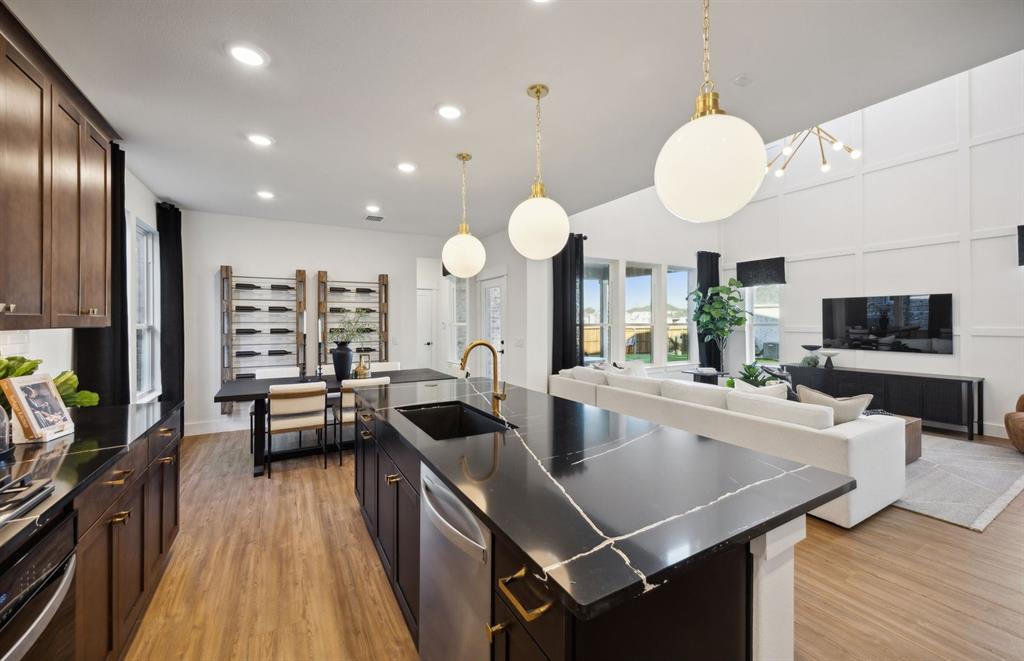 *Model Representation - Large island gathering room and dining areas overlooking