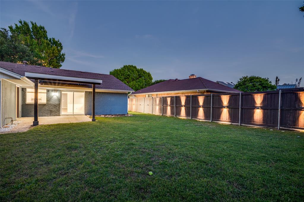 Oversized Yard with Custom Lighting and Privacy Fence