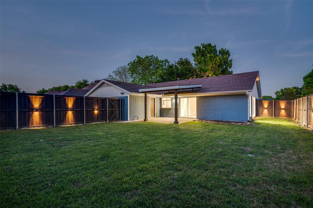 Oversized Yard with Custom Lighting and Privacy Fence