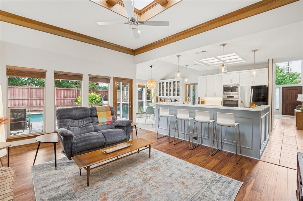 Family room with lots of windows and skylight