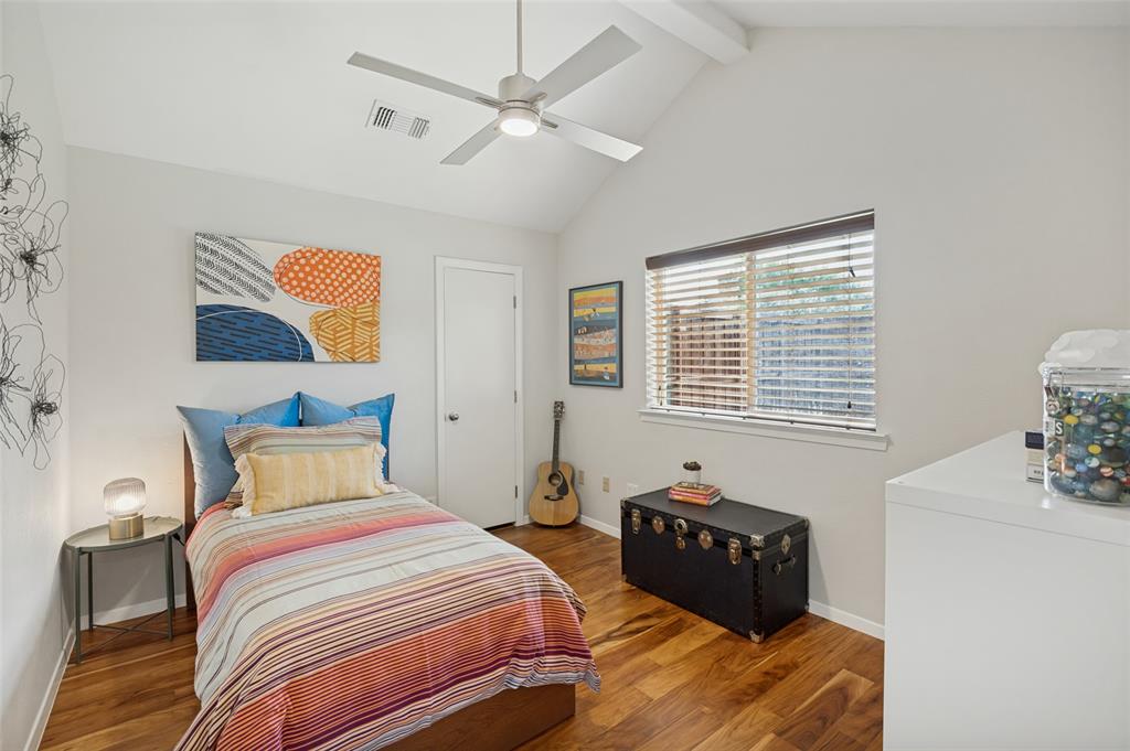 bedroom with vaulted ceiling