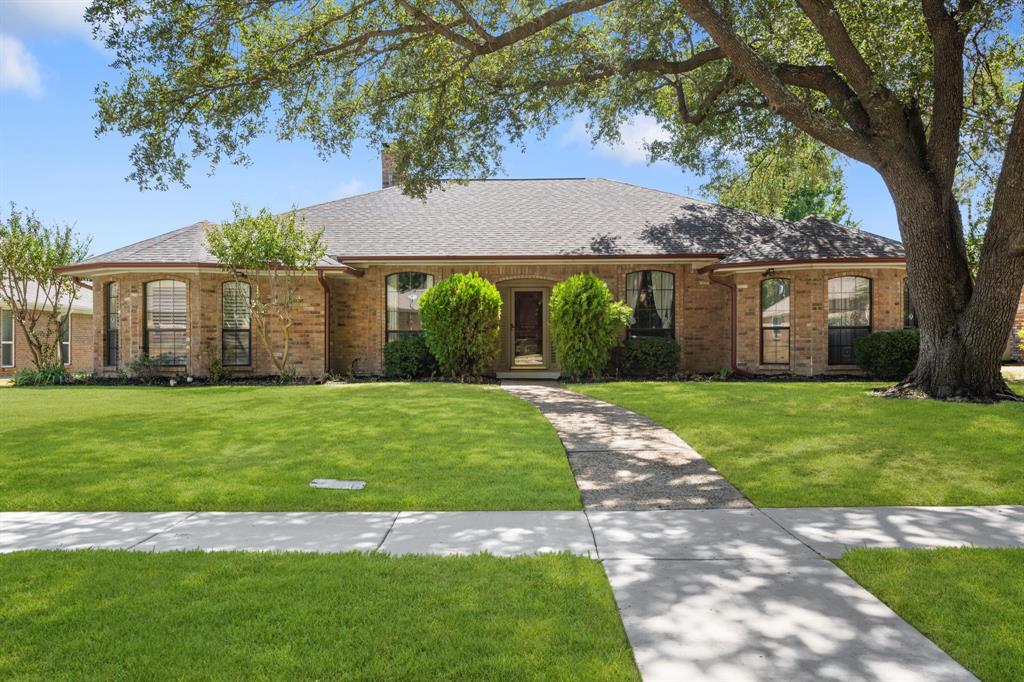 Beautifully maintained 4-bedroom, 3-bath home showcasing timeless brick architecture, mature trees, and beautifully manicured landscaping. The inviting front entry, expansive lawn, and charming curb appeal create a warm and welcoming first impression. Beautifully maintained 4-bedroom, 3-bath home showcasing timeless brick architecture, mature trees, and beautifully manicured landscaping. The inviting front entry, expansive lawn, and charming curb appeal create a warm and welcoming first impression.
