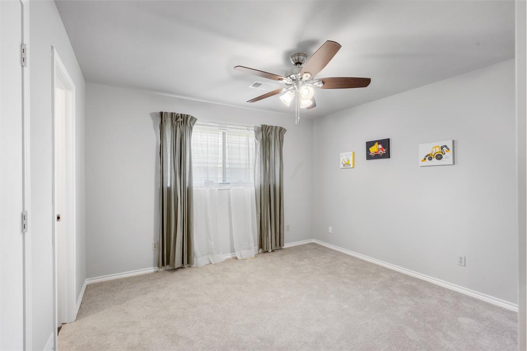 Secondary bedroom on one side of the jack and jill bathroom.