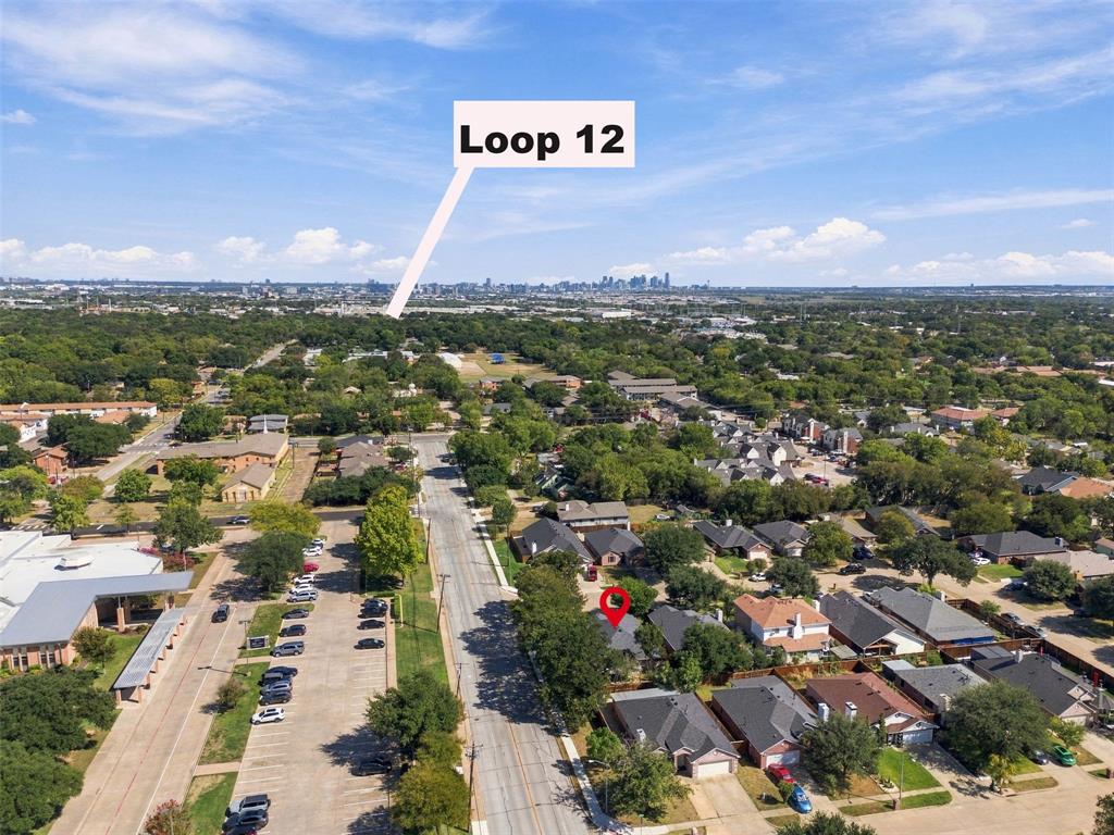 Aerial perspective of the residential property situated within an established suburban setting featuring mature tree canopy and surrounding thoroughfares