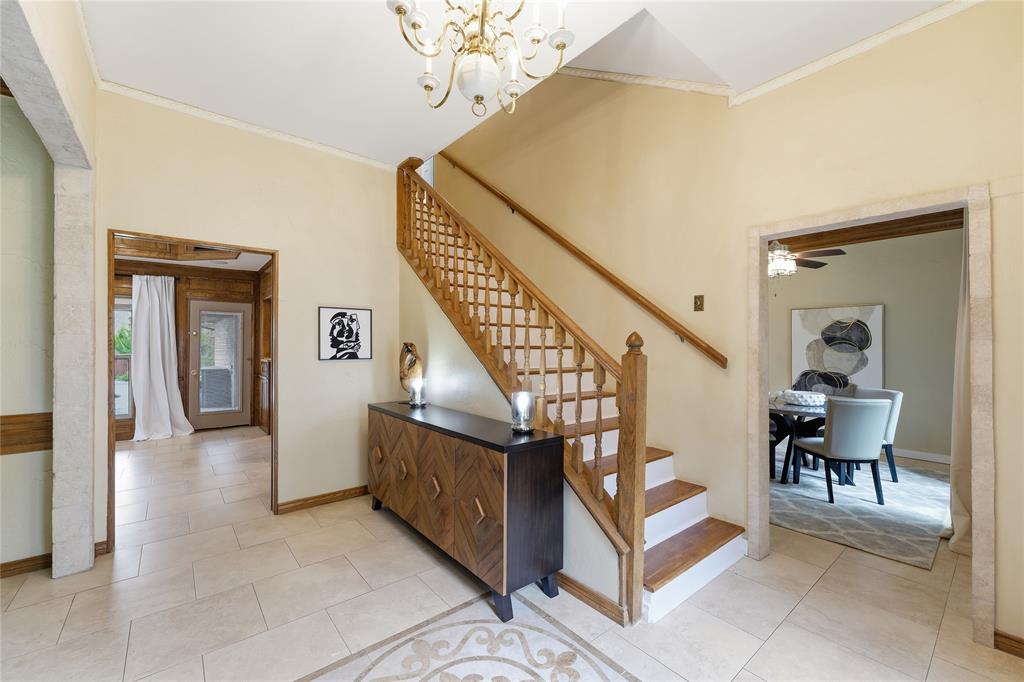 Wood stairs up to the second floor.